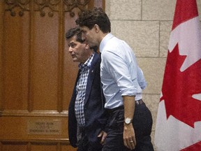 Prime Minister Justin Trudeau and Unifor National President Jerry Dias make their way to a meeting on Parliament Hill in Ottawa on Nov. 27, 2018. (THE CANADIAN PRESS)