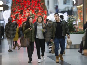 Shopping in the Toronto Eaton Centre for Christmas on Friday November 30, 2018. (Stan Behal/Toronto Sun/Postmedia Network)