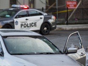 A silver Honda Accord riddled with bullets following a police involved shooting at Willowridge Rd., near Eglinton Ave W., and Martin Grove Rd. in Toronto, Ont. on Thursday November 22, 2018. (Ernest Doroszuk/Toronto Sun/Postmedia)