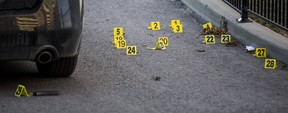 Evidence markers following a police involved shooting at Willowridge Rd., near Eglinton Ave W., and Martin Grove Rd. in Toronto, Ont. on Thursday November 22, 2018. (Ernest Doroszuk/Toronto Sun/Postmedia)