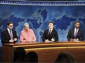 In this Nov. 10, 2018 photo provided by NBC, Lt. Com. Dan Crenshaw, from left, a congressman-elect from Texas, Pete Davidson, Anchor Colin Jost, and Anchor Michael Che appear during Saturday Night Live's "Weekend Update" in New York. Davidson made his apologies to Crenshaw whose appearance he mocked, saying Crenshaw "deserves all the respect in the world."