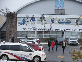 Parents, police and security were on hand at St. Michael's College on Bathurst St. as parents attended an information meeting regarding multiple sex assault allegations involving students -- one of which was caught on video -- on Friday November 16, 2018. (Jack Boland/Toronto Sun/Postmedia Network)