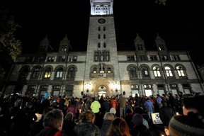 Community members hold candles at a vigil for the victims of the Pittsburgh Synagogue shooting at Cambridge City Hall in Cambridge, Massachusetts on October 30, 2018. (Joseph Prezioso/AFP/Getty Images)
