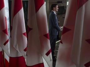 Prime Minister Justin Trudeau speaks during a news conference following the APEC Summit in Port Moresby, Papua New Guinea, Sunday, Nov. 18, 2018.