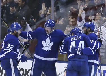Toronto Maple Leafs celebrate after the Leafs left wing Tyler Ennis (63) scores in the second period on Monday November 19, 2018.The Toronto Maple Leafs host the Columbus Blue Jackets at the Scotiabank Arena in Toronto, On. Veronica Henri/Toronto Sun/Postmedia Network