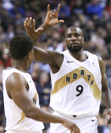 Toronto Raptors forward Serge Ibaka (9) and Toronto Raptors guard Kyle Lowry (7) on Friday November 23, 2018. The Toronto Raptors host the Washington Wizards at the Scotiabank Arena in Toronto, Ont. Toronto Raptors beat the Washington Wizards 125-107. Veronica Henri/Toronto Sun/Postmedia Network