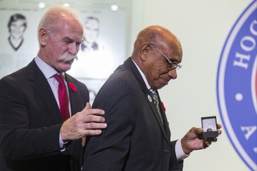Lanny McDonald, Chairman of the Hockey Hall of Fame, presents one of the 2018 Inductees into the Hockey Hall of Fame -  Willie OÕRee - with his ring during a presentation at the Hockey Hall of Fame in Toronto, Ont. on Friday November 9, 2018. Ernest Doroszuk/Toronto Sun/Postmedia