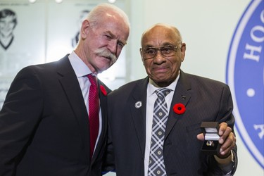 Lanny McDonald, Chairman of the Hockey Hall of Fame, presents one of the 2018 Inductees into the Hockey Hall of Fame -  Willie OÕRee - with his ring during a presentation at the Hockey Hall of Fame in Toronto, Ont. on Friday November 9, 2018. Ernest Doroszuk/Toronto Sun/Postmedia