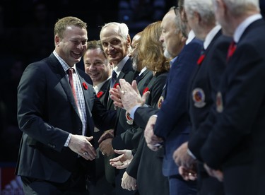 Hockey Hall of Fame inductee Martin Brodeur comes out to be greeted by alumni in Toronto on Friday November 9, 2018. Jack Boland/Toronto Sun/Postmedia Network