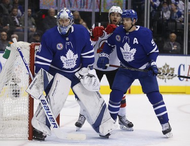 New Jersey Devils Taylor Hall LW (9) and Toronto Maple Leafs John Tavares C (91)  in front of Frederik Andersen G (31)during the second period in Toronto on Friday November 9, 2018. Jack Boland/Toronto Sun/Postmedia Network