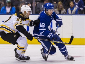 Toronto Maple Leafs Mitchell Marner during 1st period action against Boston Bruins John Moore  at the Scotiabank Arena in Toronto on Monday November 26, 2018. Ernest Doroszuk/Toronto Sun/Postmedia