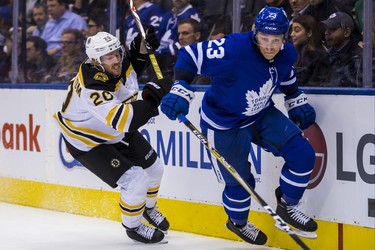 Toronto Maple Leafs Travis Dermott during 2nd period action against Boston Bruins Joakim Nordstrom at the Scotiabank Arena in Toronto on Monday November 26, 2018. Ernest Doroszuk/Toronto Sun/Postmedia