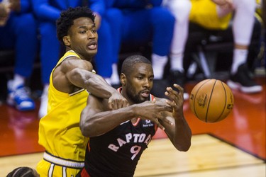 Toronto Raptors Serge Ibaka during 1st half action against the Golden State Warriors Damian Jones  at the Scotiabank Arena in Toronto, Ont. on Thursday November 29, 2018. Ernest Doroszuk/Toronto Sun/Postmedia