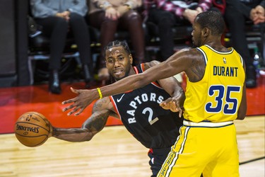 Toronto Raptors Kawhi Leonard during 2nd half action against Golden State Warriors Kevin Durant at the Scotiabank Arena in Toronto, Ont. on Thursday November 29, 2018. Ernest Doroszuk/Toronto Sun/Postmedia