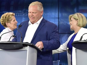 Premier Doug Ford, former Liberal premier Kathleen Wynne (left) and NDP leader Andrea Horwath are pictured at a debate prior to June's eleciton. (The Canadian Press)