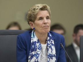 Former premier Kathleen Wynne appeared Monday before a Queen's Park committee. She defended her government's decision to lower hydro bills by burdening future ratepayers with additional costs. (Stan Behal, Toronto Sun)