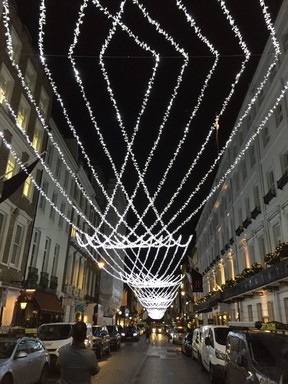 Many streets in central London have elaborate lights like these on Albemarle Street. (ROBIN ROBINSON)