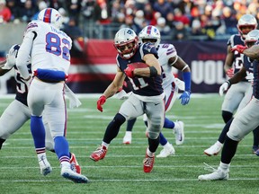 Julian Edelman and the New England Patriots had a cover taken away from them by a late Bills charge. (GETTY IMAGES)