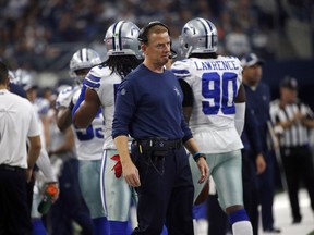 Even Dallas Cowboys head coach Jason Garrett knows better than to play his stars in a meaningless game. (AP PHOTO)