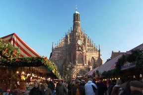 Nurnberg’s cathedral towers over the city’s Christmas market, the largest of its kind in Germany. (ETBD staff photo)