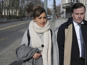 Television actress Allison Mack leaves federal court in New York, Thursday, Dec. 6, 2018. She is expected to plead guilty on monday. (AP Photo/Seth Wenig)