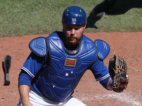 Jays catcher Russell Martin waits for the throw at the  Rogers Centre on July 8, 2018 in Toronto, Canada. (Photo by Tom Szczerbowski/Getty Images)