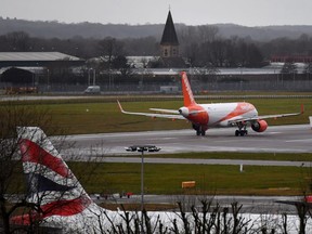 An EasyJet aircraft prepares to take off from the runway at London Gatwick Airport, south of London, on December 21, 2018, as flights resumed following the closing of the airfield due to a drones flying.