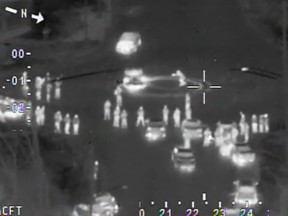Police helicopter footage of stunt drivers pulling burnouts in a Pickering, Ont. intersection on Sunday, Dec. 16 2018. (Courtesy Durham police)