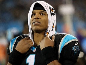Panthers quarterback Cam Newton looks on during NFL action against the Saints at Bank of America Stadium in Charlotte, N.C., on Dec. 17, 2018.
