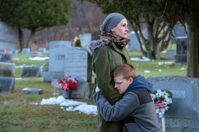 This image released by Elevation Pictures shows Lucas Hedges, right, and Julia Roberts in a scene from “Ben is Back.” (Mark Schafer/Elevation Pictures)