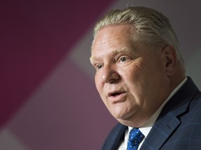 Ontario Premier Doug Ford speaks to the media during a press conference after visiting the new Amazon office in downtown Toronto on Dec. 18, 2018. THE CANADIAN PRESS/Nathan Denette