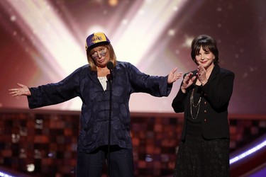 SANTA MONICA, CA - JUNE 08:  Actress/director Penny Marshall (L) and actress Cindy Williams speak onstage during the 6th annual "TV Land Awards" held at Barker Hangar on June 8, 2008 in Santa Monica, California.  (Photo by Kevin Winter/Getty Images for TV Land)