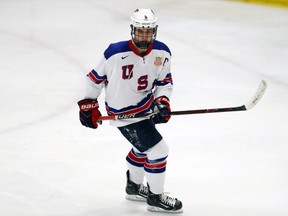 In this Wednesday, Nov. 21, 2018, photo, Jack Hughes, expected to be a top pick in the next NHL hockey draft, plays against Bowling Green in Plymouth, Mich.
