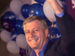 Premier Mike Harris celebrates the Tory majority victory in his home riding of North Bay June 3, 1999. (Toronto Sun files)