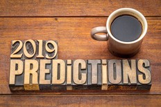 2019 prediction concept - text in vintage letterpress wood type printing blocks with a cup of coffee