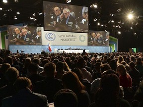 Participants attend the COP24 U.N. Climate Change Conference 2018 in Katowice, Poland, Thursday, Dec. 13, 2018.