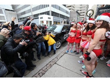 Around 50 runners make their way around Yorkville during the 11th annual Toronto Speedo Run on Saturday December 15, 2018. Clad in nothing but running shoes and Speedo bathing suits, entrants braved the cold to raise money for the Toys and Games Fund at Toronto Hospital for Sick Children.  Dave Abel/Toronto Sun/Postmedia Network