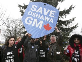 GM works create at Tree of Hope in Memorial Park on Friday December 14, 2018 in Oshawa, Ontario. (Veronica Henri/Toronto Sun)