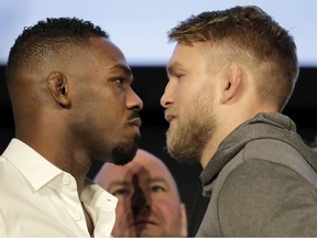 Jon Jones, left, and Alexander Gustafsson face off while posing for a photographers during a news conference talking about their light heavyweight mixed martial arts bout, Friday, Nov. 2, 2018, at Madison Square Garden in New York.