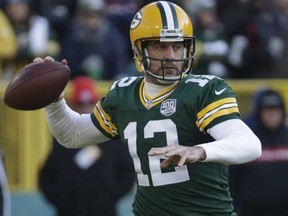 Green Bay Packers' Aaron Rodgers throws during the first half of an NFL football game against the Atlanta Falcons Sunday, Dec. 9, 2018, in Green Bay, Wis. (AP Photo/Mike Roemer) ORG XMIT: WIMG110