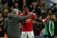 Manchester United's manager Jose Mourinho (L) and French midfielder Paul Pogba are on a path to a breakup.  (Photo by Ian KINGTON / Getty Images