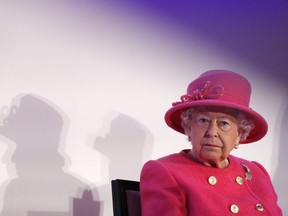 Britain's Queen Elizabeth II visits the Royal Insitute of Chartered Surveyors (RICS) to mark its 150th anniversary in central London on November 20, 2018.