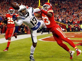 Kansas City Chiefs cornerback Kendall Fuller  breaks up a pass intended for Los Angeles Chargers wide receiver Keenan Allen during the game at Arrowhead Stadium on Dec. 13, 2018 in Kansas City, Mo.