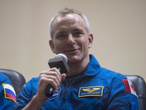 Expedition 58 Flight Engineer David Saint-Jacques answers a question during a press conference, Sunday, Dec. 2, 2018 at the Cosmonaut Hotel in Baikonur, Kazakhstan.