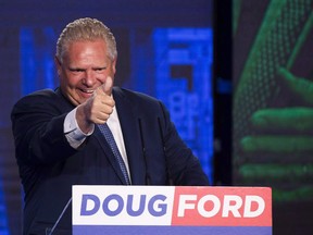 Ontario PC leader Doug Ford reacts after winning the Ontario Provincial election to become the new premier in Toronto, on Thursday, June 7, 2018. THE CANADIAN PRESS/Nathan Denette