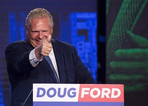 Ontario PC leader Doug Ford reacts after winning the Ontario Provincial election to become the new premier in Toronto, on Thursday, June 7, 2018. (THE CANADIAN PRESS/Nathan Denette)