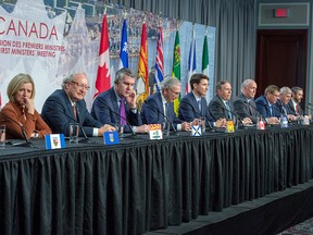 Canadian premiers and the Prime Minister speak to the media at the First Ministers closing news conference, Friday, December 7, 2018 in Montreal. They are from the left: Rachel Notley, Alberta, Wade MacLauchlan, PEI, Stephen McNeil, Nova Scotia, Blaine Higgs, New Brunswick, Justin Trudeau, Canada, Francois Legault, Quebec, John Horgan, British Columbia, Scott Moe, Saskatchewan, Dwight Ball, Newfoundland, and Sandy Silver, Yukon.