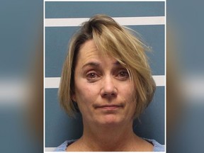 California teacher Margaret Gieszinger was arrested Wednesday after videos posted to social media showed her foricibly cut a student's hair at University Preparatory High School in Visalia, Calif. (Tulare County Sheriff's photo)