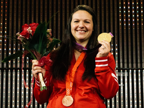 A decade after the Beijing Olypics and six years after the London Olympics, Canadian weightlifter Christine Girard has finally received her bronze and gold medals after it was determined other athletes who placed ahead of her cheated. (photo courtesy of the Canadian Olympic Committee)