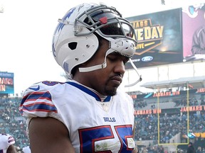 In this Jan. 7, 2018, file photo, Buffalo Bills defensive end Jerry Hughes leaves the field after an NFL wild-card playoff football game against the Jacksonville Jaguars, in Jacksonville, Fla.